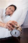 Alarm clock successfully woke up young woman