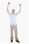 Portrait of a mature man with the arms up against a white background