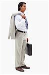 Portrait of a serious office worker holding his jacket over his shoulder and a briefcase against a white background