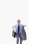 Happy businessman with suitcase about to jump against a white background