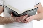 Man reading the Bible. Focus on the Bible