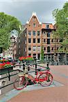 Amsterdam. Beautiful  bridge decorated with flowers over  the canal Brouwersgracht