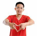 Asian young man showing love hand sign