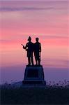 Foggy sunrise behind the 73rd New York Infantry Monument at the Gettysburg National Military Park in Pennsylvania,USA.