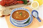 Asian lobster soup with lemon, dill and bread