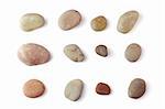 Collection of sea pebbles isolated on white background