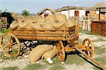 Old wooden cart with bags in historical museum, Ataman, Taman peninsula, Russia