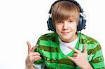 Close-up portrait of a male teenager listening to music with headphone. Isolated on white.