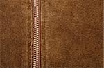 Brown suede texture and zipper background