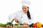 Stock image of female chef preparing food isolated on white background