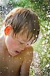 Young child playing in the water