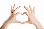 Female hands making heart sign isolated on white background