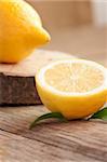 Organic  lemon fruit on nature wooden background