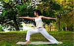 yoga woman on green grass