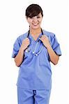 Stock image of confident female healthcare worker isolated on white background