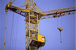 Image of a construction crane on blue sky
