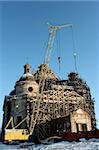 Restoration of the old church against the sky