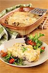 Potato gratin with mushrooms, eggs, cheese and mixed greens