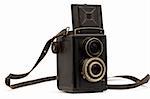 Old camera with a strap on a white background