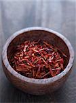 close up of a bowl of dried chili flakes