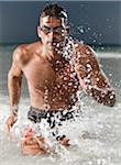 Schwimmer Running Out of Water, Miami Beach, Florida, USA