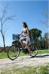 Woman Riding Bicycle