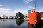 View of waterfront towards Museum of Liverpool and Royal Liver Building, Liverpool, UK