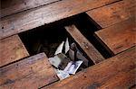 Money under floorboards