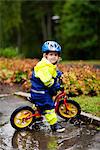Boy cycling in park