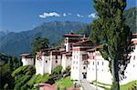 Trongsa Dzong set against tree-covered mountains, Trongsa, Bhutan, Himalayas, Asia