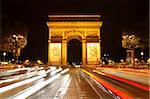 Arc de Triomphe and Champs Elysees at night, Paris, France, Europe