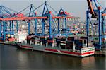 Container ship at container terminal, port of Hamburg, Germany, Europe