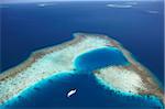 Aerial view of coral reef and islands, Maldives, Indian Ocean, Asia