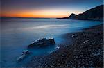 Dämmerung am Ufer Kiesel der Worbarrow Bay, Jurassic Coast, UNESCO Weltkulturerbe, Dorset, England, Vereinigtes Königreich, Europa