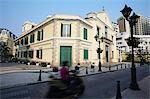 Motorbike passing St. Augustine's Church, Macau, China, Asia