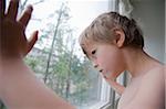 Boy with Chicken Pox Looking Out Window