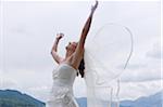 Bride with Arms in Air