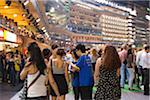 Punters unwinding over a few drink of beer at the Happy Valley Jockey Club, Hong Kong