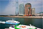 Looking over to ICC Tower and Union Square at West Kowloon from Tsimshatsui, Hong kong