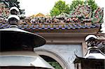 Ceramic carving on the tiled roofs of Kaiyuan guarding temple, old town of Chaozhou, China