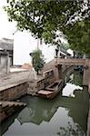 Canal and stone bridge in the old town of Luzhi, Suzhou, China