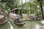 Tourist boats on canal at old town of Luzhi, Suzhou, China