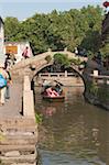 Stone bridge on canal, old town of Zhouzhaung, Kunshan, Jiangsu Province, China