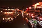 Restaurants by the canal side at night, old town of Xitang at night, Zhejiang, China