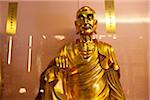 Statue of Luo Han monk at Chuk Lam Shim Yuen Bamboo Grove Monastery, Tsuen Wan, Hong Kong