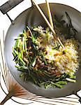 rice with baby onions in wok