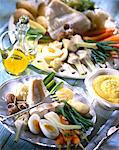 Plates of Aïoli fish, vegetables and boiled egg