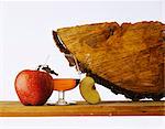 Glass of Calvados with apple and wood