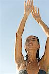 Water splashing on woman's face