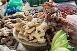 Varieties of ginger roots on market stall